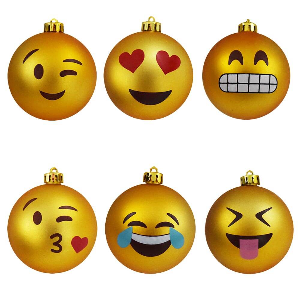 blalen smileys fuq dekorazzjonijiet emoticon tas-siġra tal-Milied