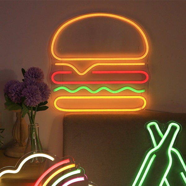 wassal sinjal tan-neon glowing fuq il-ħajt - hamburger