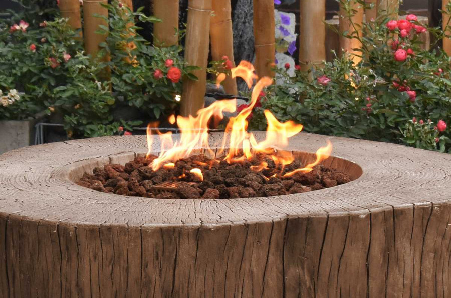 Stump firepit nar injam imitazzjoni foloz mill-konkrit